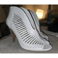 Vince Camuto "Acha" Woven Leather Peep-Toe Booties!